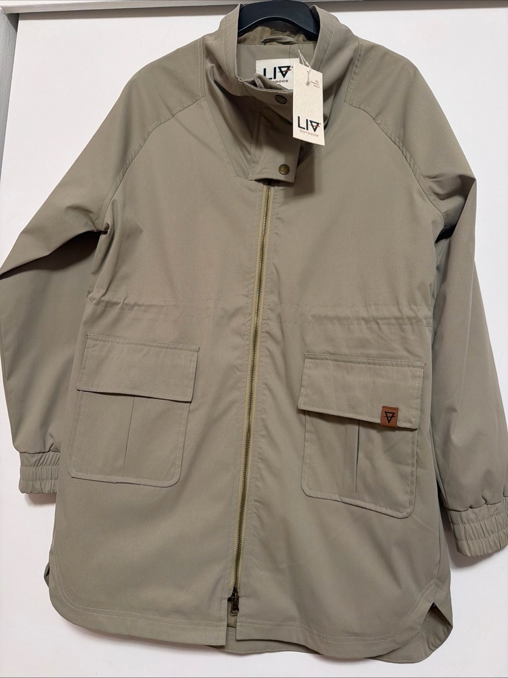 Women's Lightweight Tan Raincoat with Front Pockets